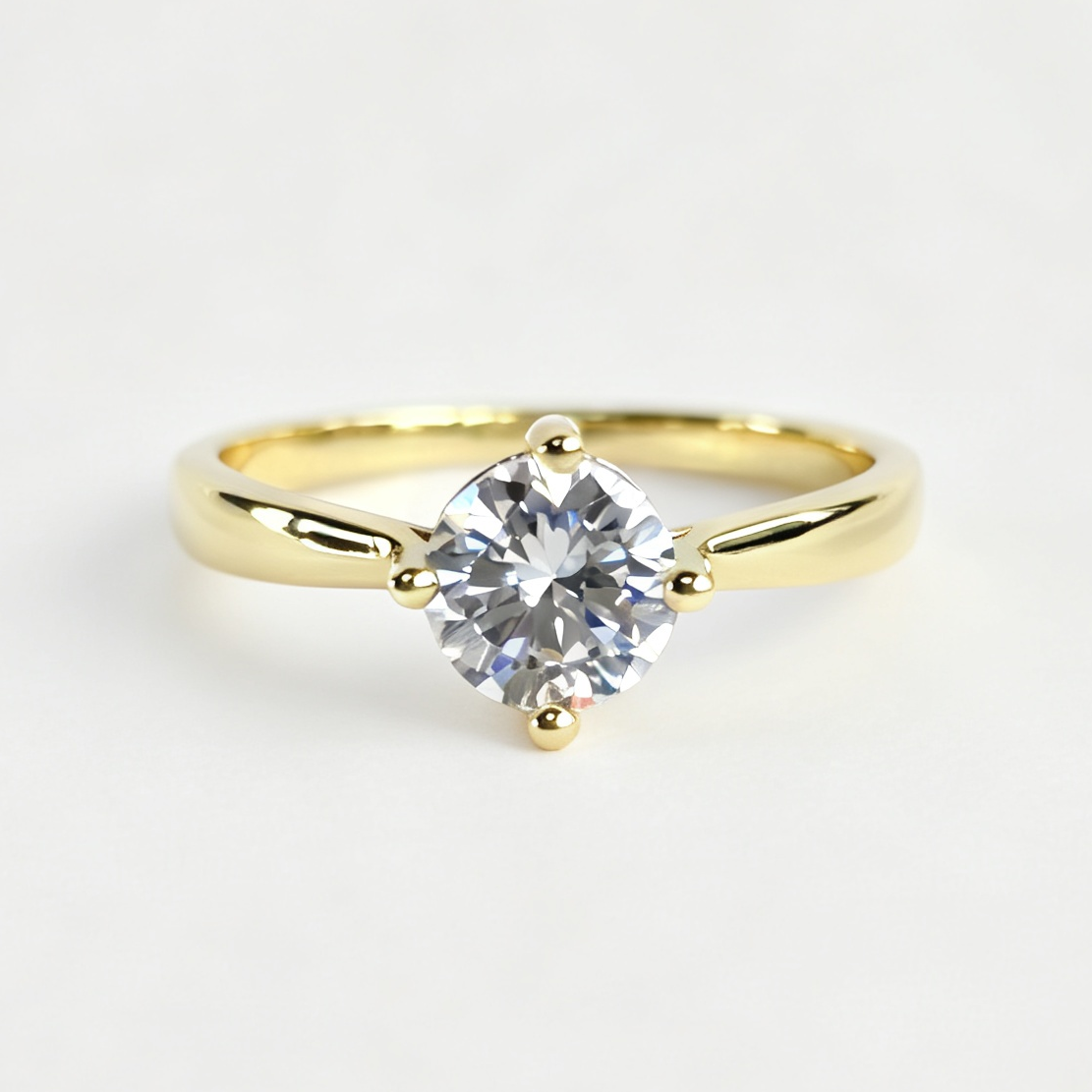 Gemma round-cut moissanite ring on hand — AUMIRE JEWEL