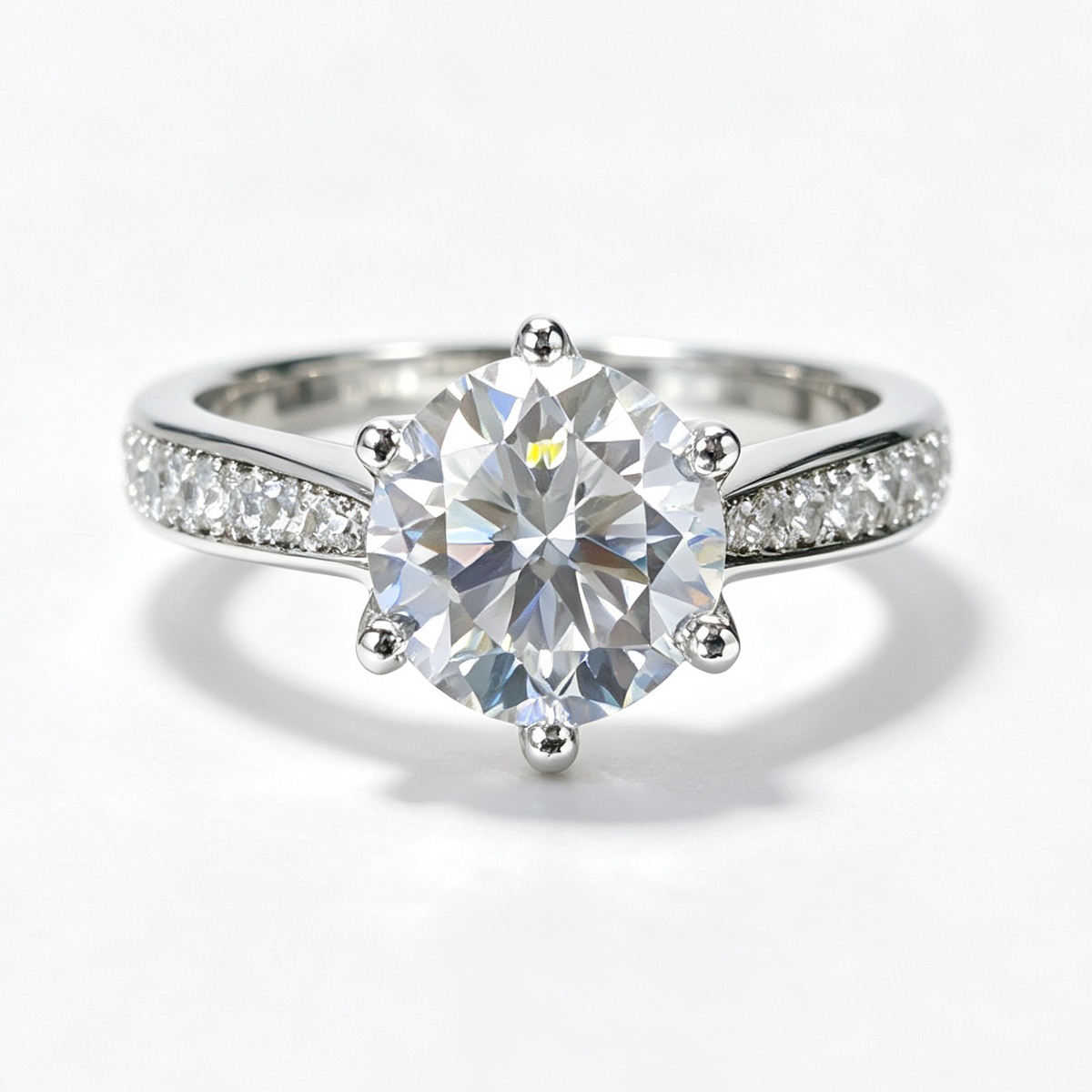 Luxurious Six-Prong round-cut moissanite ring on hand — AUMIRE JEWEL