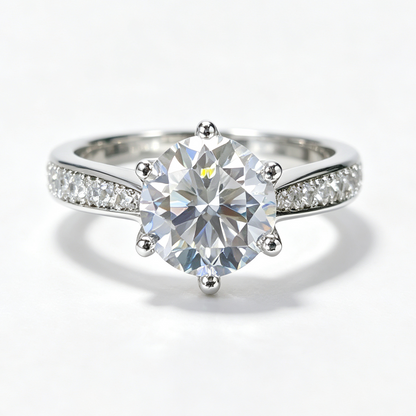 Luxurious Six-Prong round-cut moissanite ring on hand — AUMIRE JEWEL
