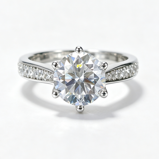 Luxurious Six-Prong round-cut moissanite ring on hand — AUMIRE JEWEL
