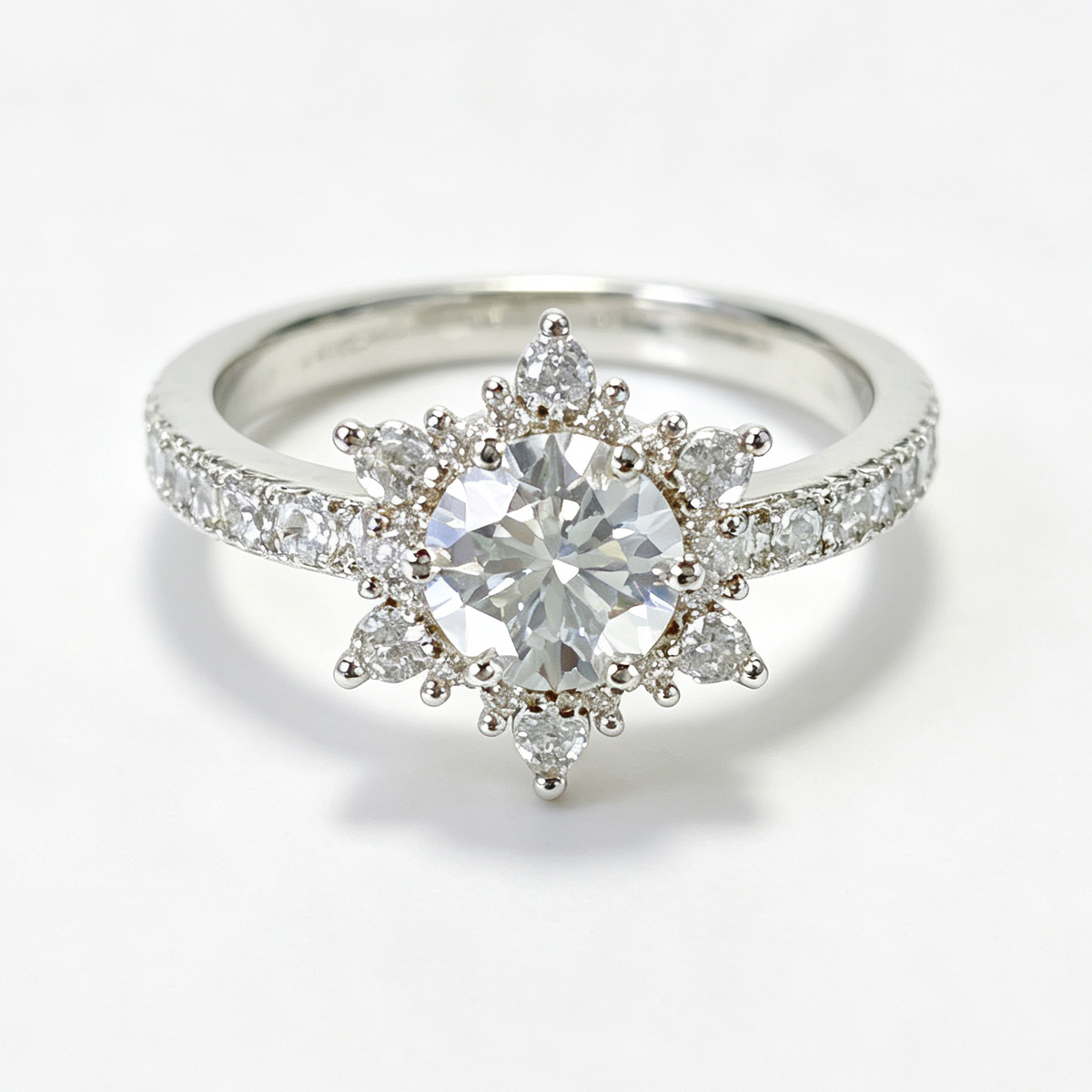 Snowflake round-cut moissanite ring on hand — AUMIRE JEWEL