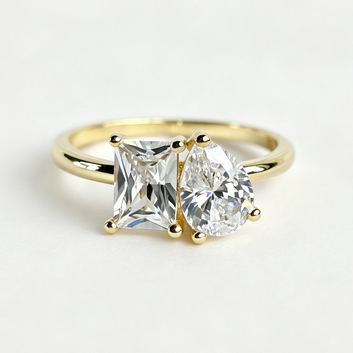 Duet two-stone pear and emerald moissanite ring on hand — AUMIRE JEWEL